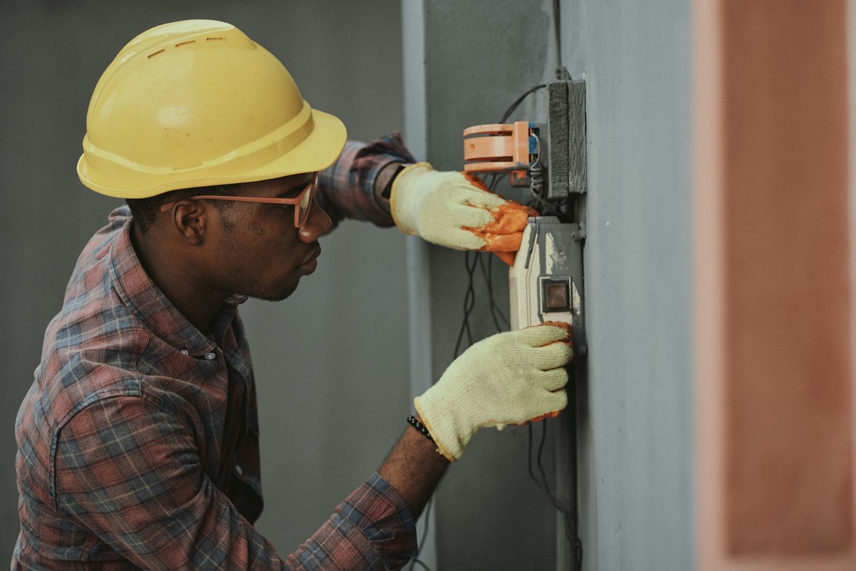Electrician working on a commercial electrical installation