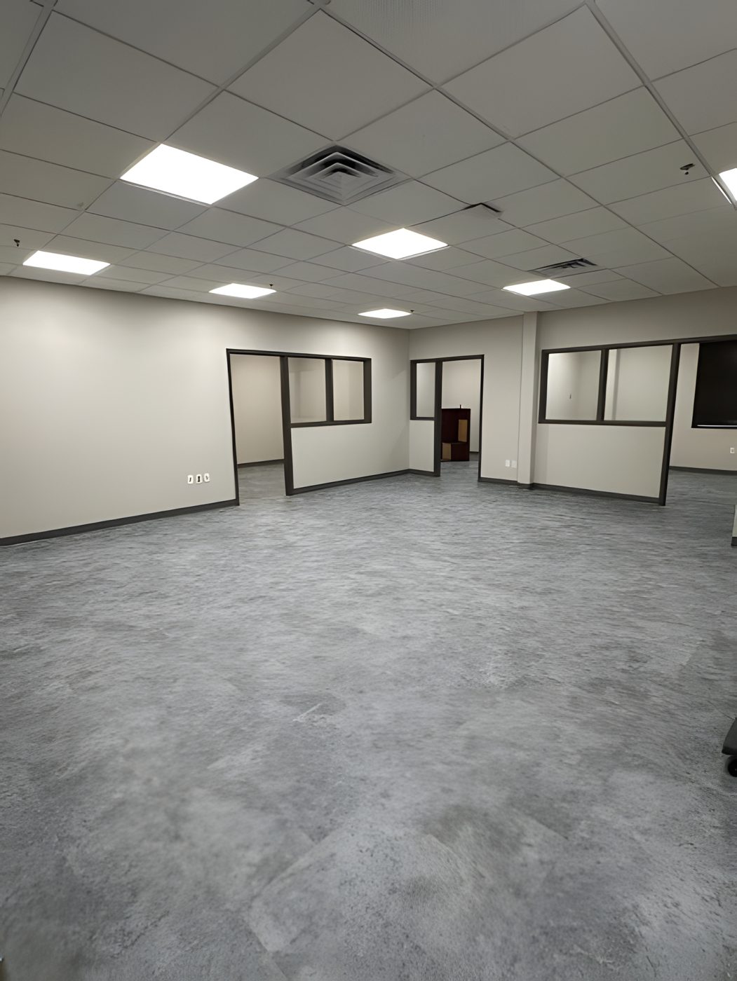 Office after remodel, clean modern finishes and new flooring